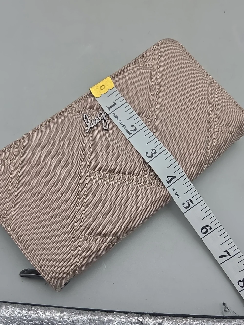 Lug Arabesque Ultra X Zip RFID Wallet in a sand Beige color